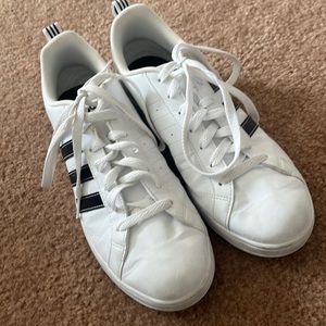 Size women’s 9 1/2 adidas shoes.
